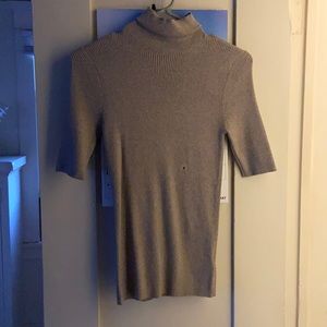 Beige short-sleeved turtle neck from express; never worn; medium size